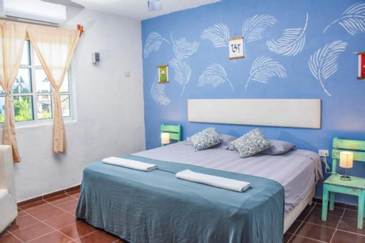Departamentos Cerca De Ferry Holbox Hotel Bagian luar foto