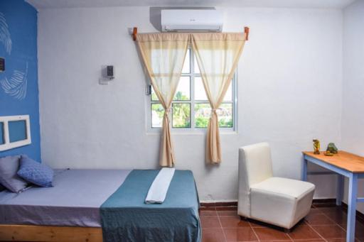 Departamentos Cerca De Ferry Holbox Hotel Bagian luar foto