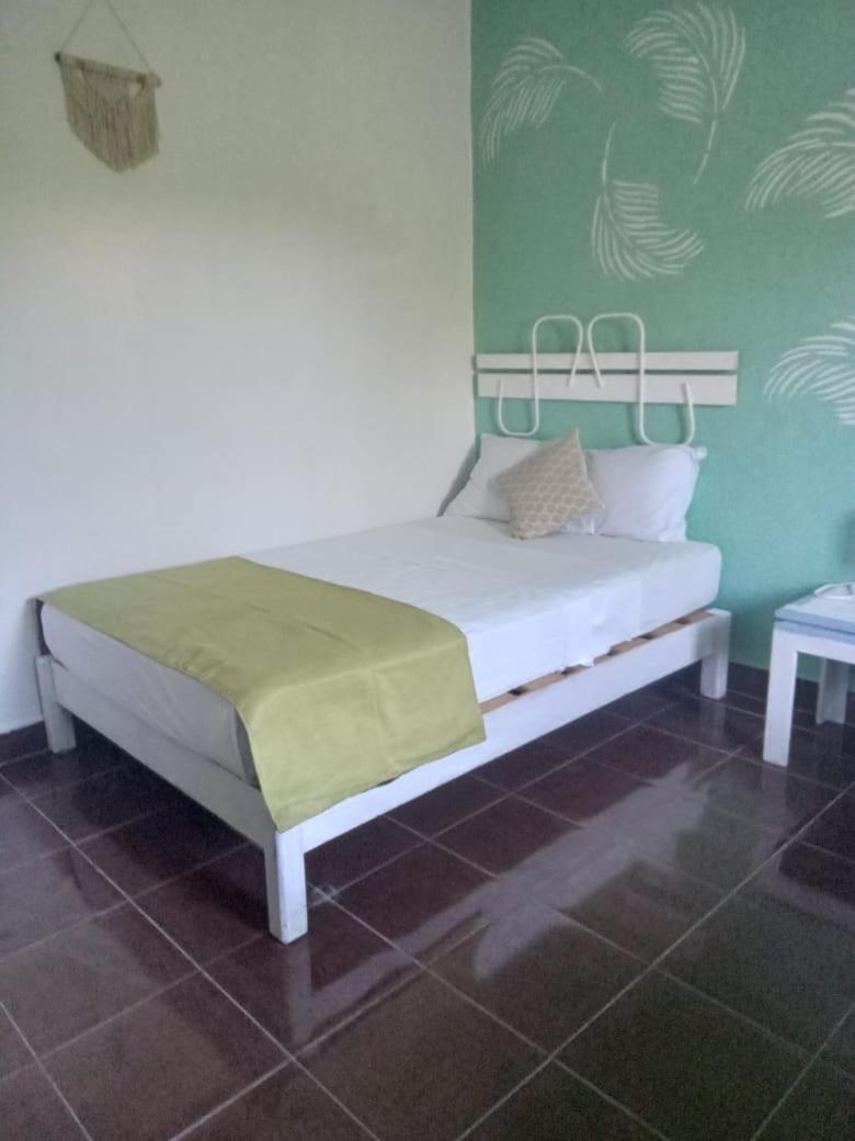 Departamentos Cerca De Ferry Holbox Hotel Bagian luar foto